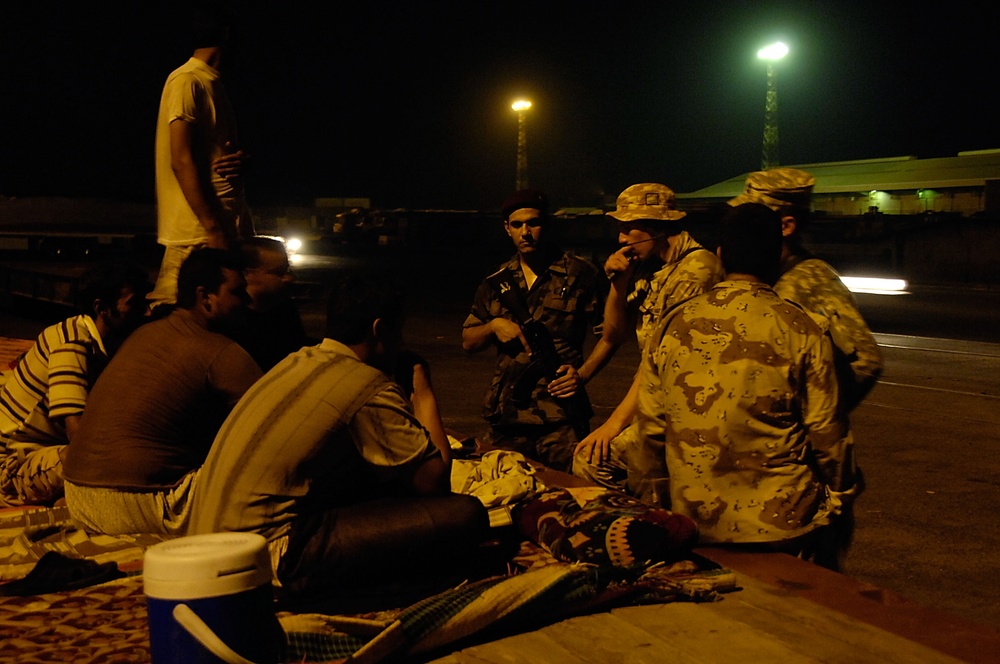 Iraqi Marines and British Soldiers Patrol Port