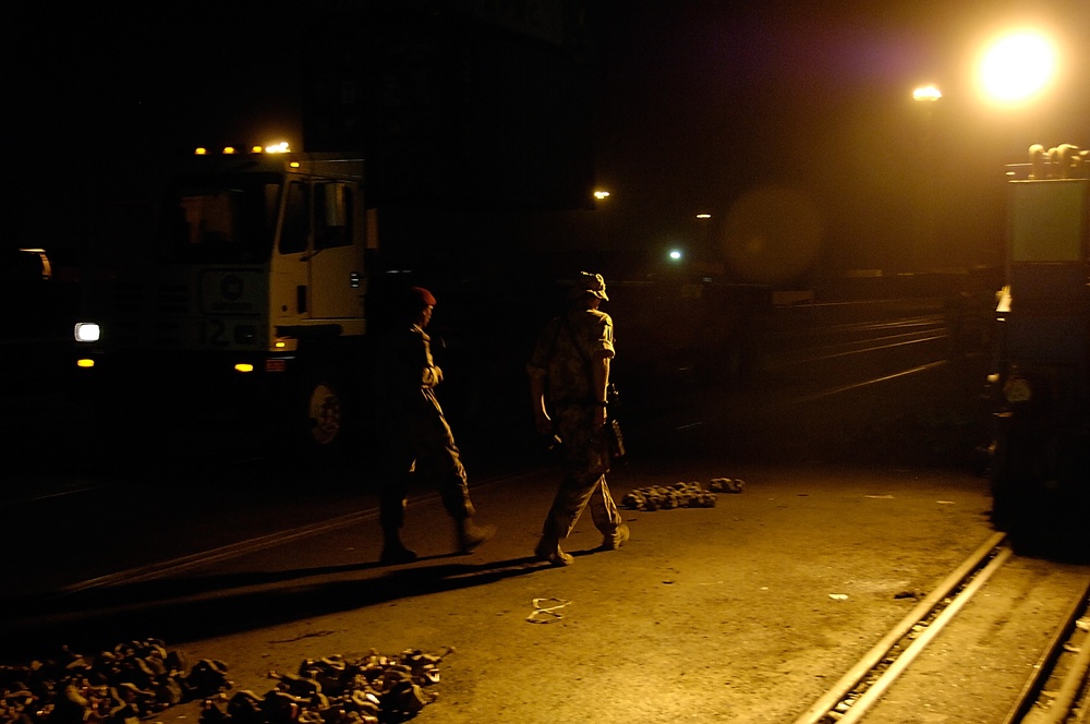 Iraqi Marines and British Soldiers Patrol Port