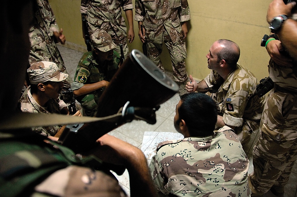 Iraqi Marines and British Soldiers Patrol Port