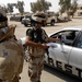 Iraqi Marines, British Soldiers Talk to Citizens