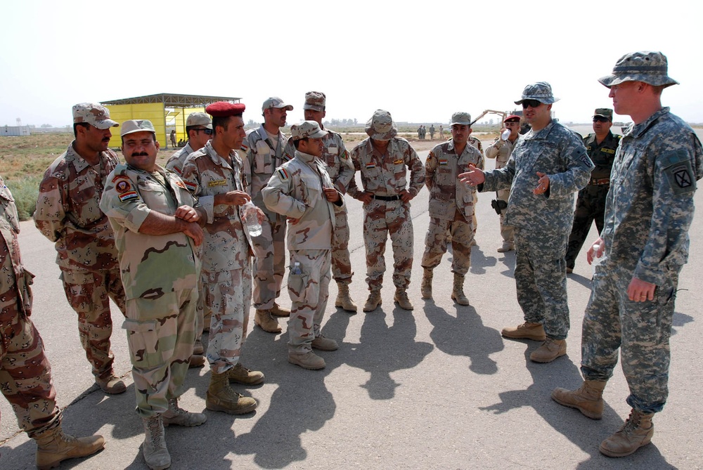 Iraqi Army receives mine detection vehicle instruction from 10th Mtn. Soldiers