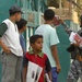 Iraqi national police hand out leaflets