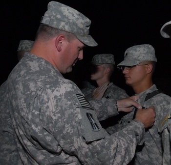 Soldiers assigned to Team Delta, Task Force 1-293rd Infantry Battalion receive awards