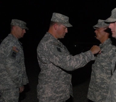 Soldiers assigned to Team Delta, Task Force 1-293rd Infantry Battalion receive awards