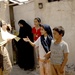 Iraqi Soldiers Hand Out Wanted Posters