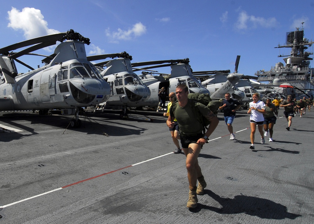 Sailors, Marines Participate in 5K Run aboard USS Iwo Jima Flight Deck