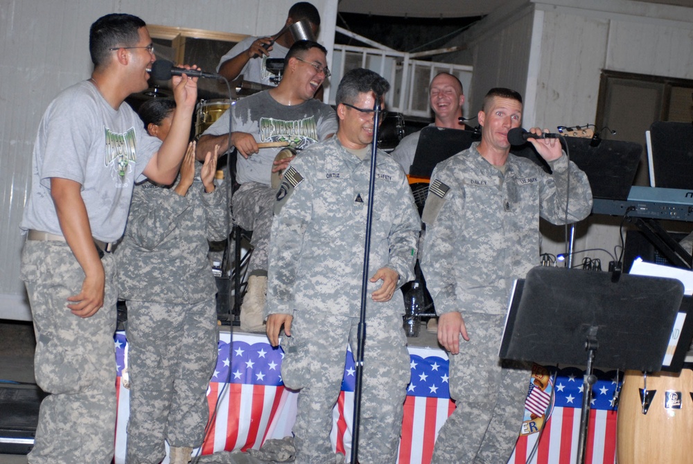 Strikers dance to Latin grooves of 4th Infantry Division Band