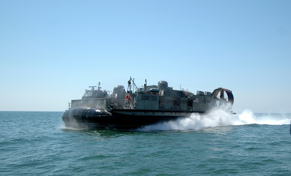 Speeding away from the USS Bataan