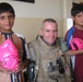 Iraqi children play soccer; Remember hero