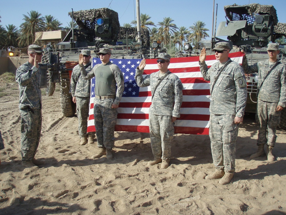 Flag from Hell's Kitchen firehouse flies true during 2-14 Cav. Regt. reenlistment ceremonies