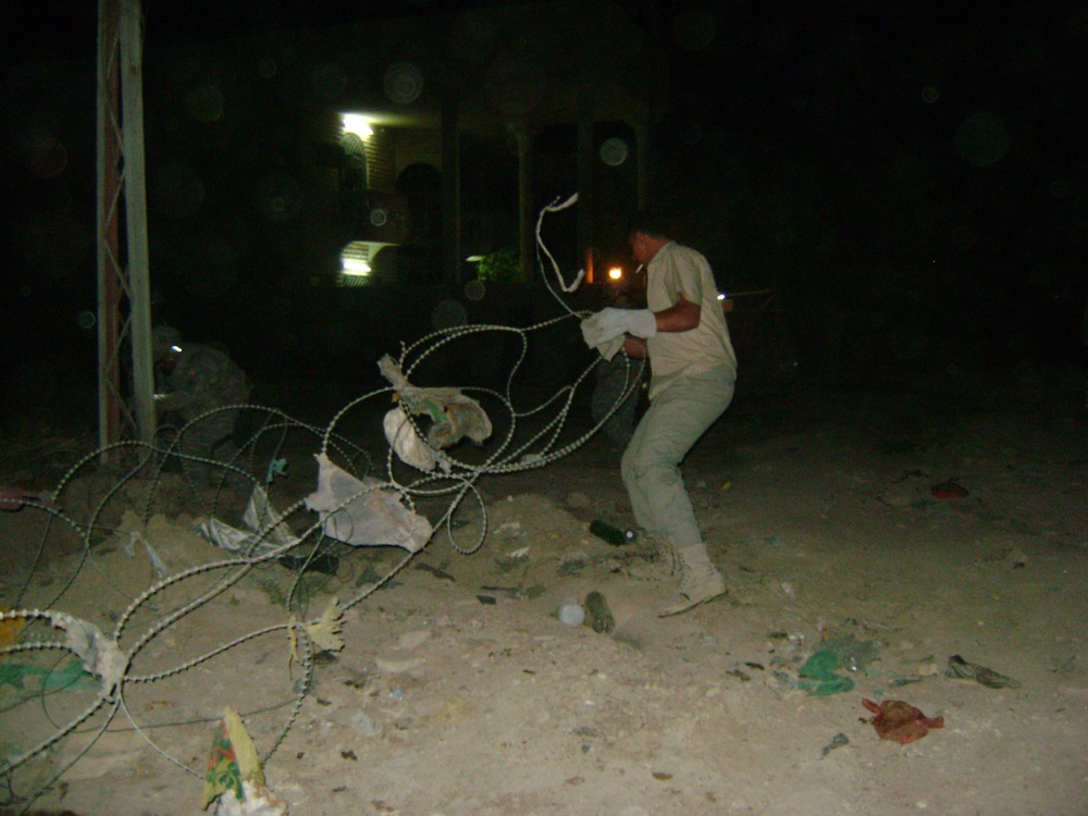 Residents anxious to clean up streets - 'Regulars,' residents work together to remove concertina wire from the streets of Jihad