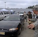 Louisiana National Guardsmen distribute supplies to residents