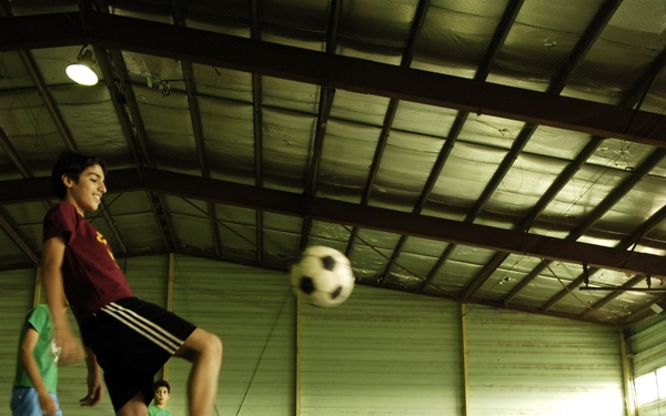 Iraqi Police and 4th ID Soldiers Conduct Foot Patrol