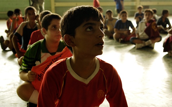 Iraqi Police and 4th ID Soldiers Conduct Foot Patrol