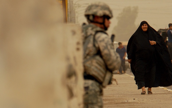Iraqi Police and 4th ID Soldiers Patrol the Streets of Abu Tshir