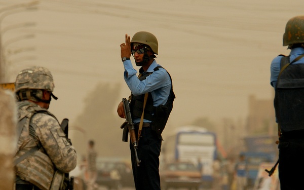 Iraqi Police and 4th ID Soldiers Patrol the Streets of Abu Tshir