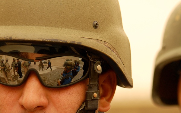 Iraqi Police and 4th ID Soldiers Patrol the Streets of Abu Tshir