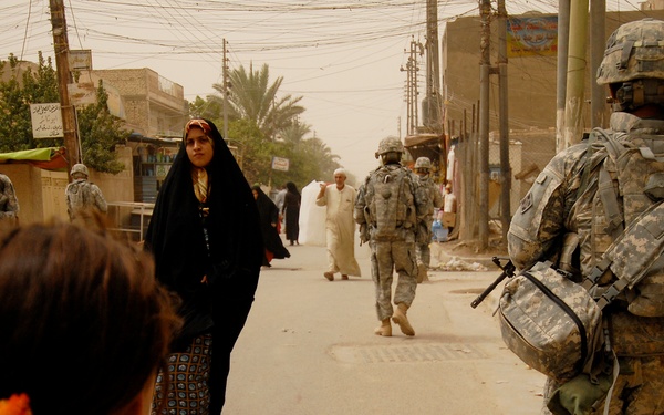Iraqi Police and 4th ID Soldiers Patrol the Streets of Abu Tshir