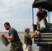 National Guard sandbags levee, protects highway