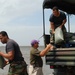 National Guard Sandbags Levee, Protects Highway