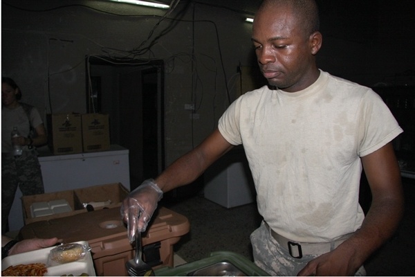 Face of Defense: Former African Pastor Serves as Soldier, Cook