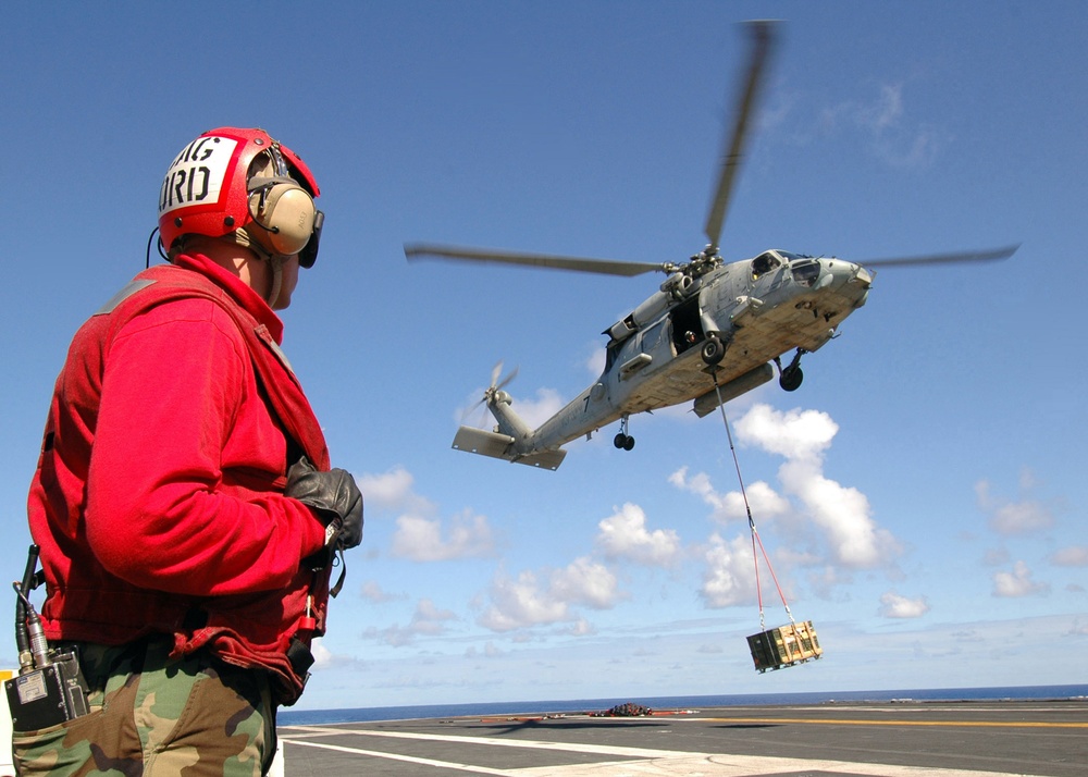SH-60F Sea Hawk Delivers Cargo