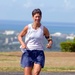 Cmdr. Kristin Barnes trains for the annual Ironman World Championship triathlon