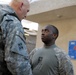 Phoenix Soldiers presented coin by new MNF-I CG