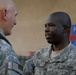 Phoenix Soldiers presented coin by new MNF-I CG