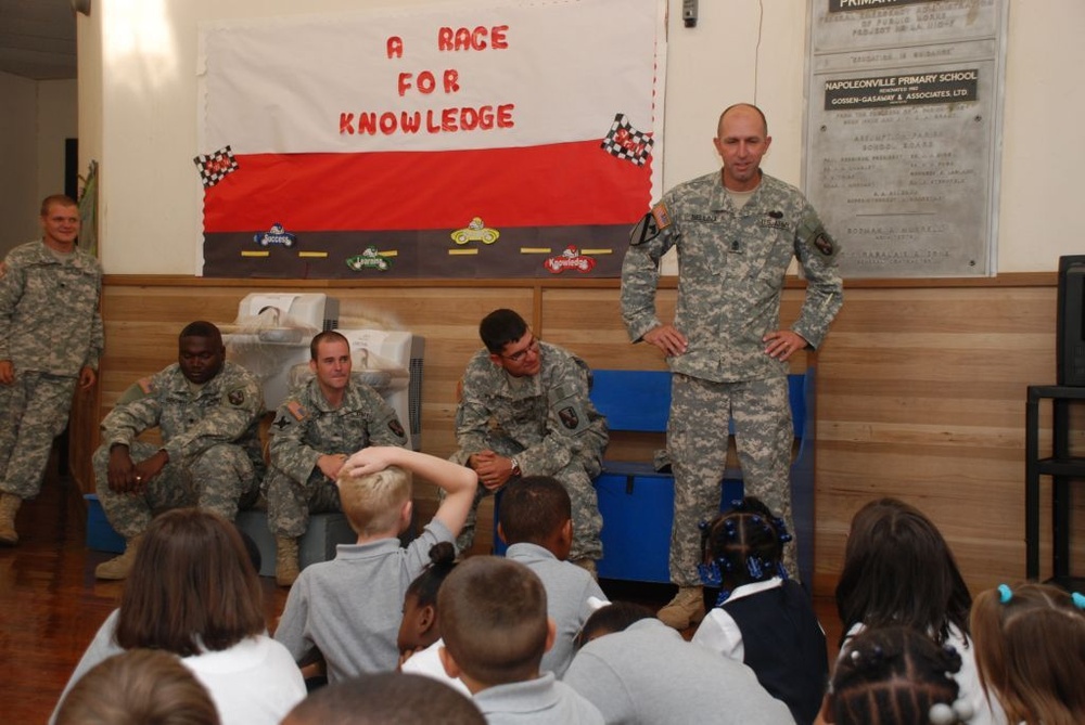 Second-graders High-five Soldiers' Helping Hands