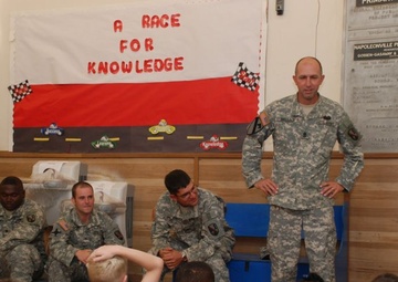 Second-graders High-five Soldiers' Helping Hands