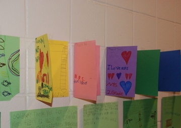 Second-graders High-five Soldiers' Helping Hands