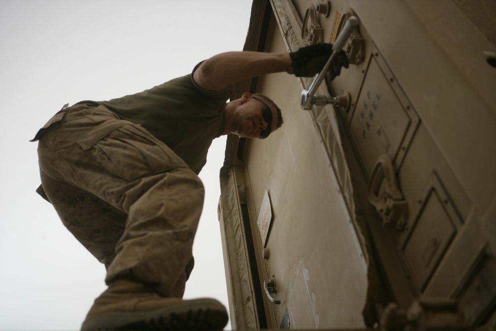 Regimental Combat Team 1 soldiers prepare to turn Camp Fallujah over to government of Iraq