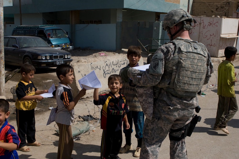 U.S. Marines Distribute Pamphlets