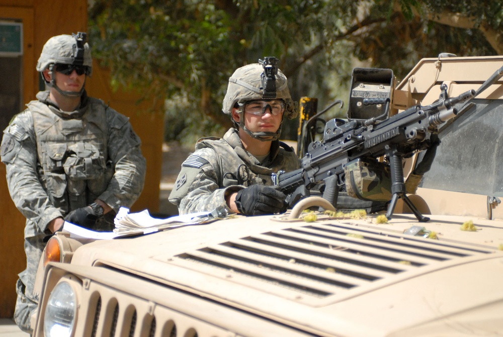 Silver Lions protect Combat Outpost  Apache entrance
