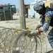 National Police, 2-30th Inf. Regt. Soldiers clear Baghdad streets of concertina wire
