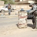 National Police, 2-30th Inf. Regt. Soldiers clear Baghdad streets of concertina wire