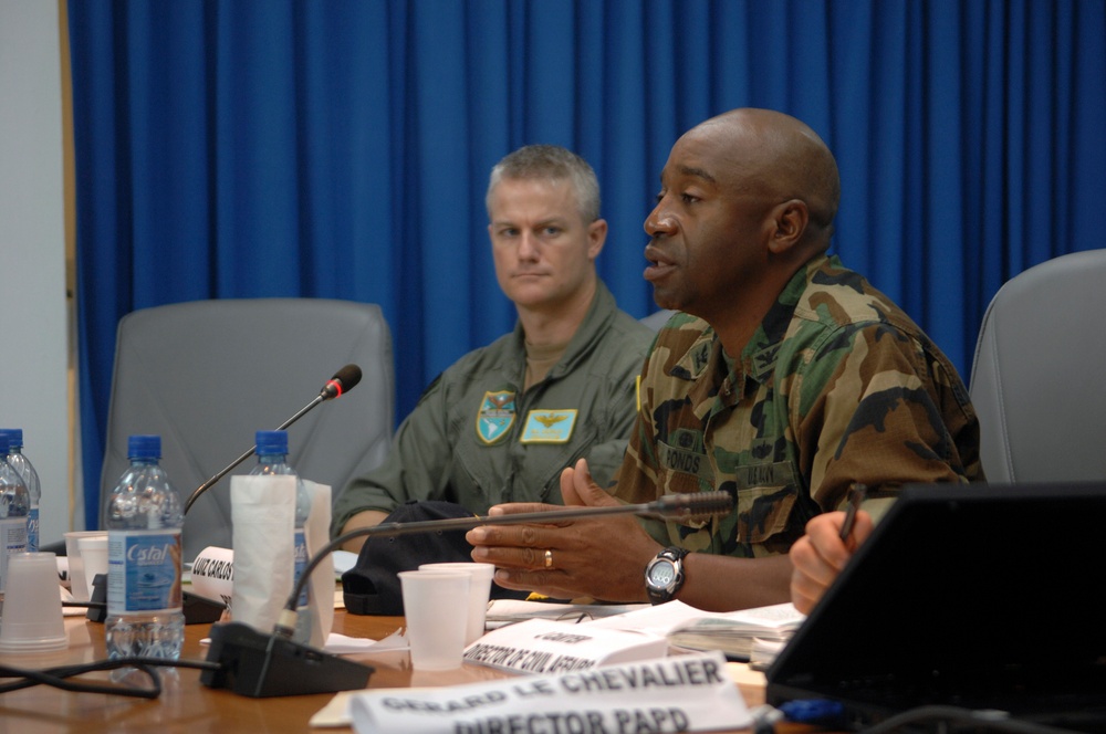 Capt. Fernandez "Frank" Ponds addresses USAID, World Food Program representatives at UN headquarters in Haiti