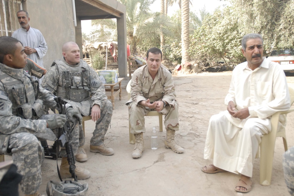 3rd Battalion, 7th Infantry Regiment Delivers Water Filters to Jelawiya Locals