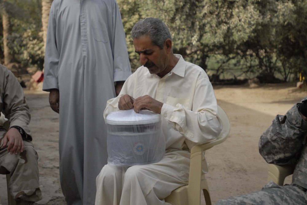 3rd Battalion, 7th Infantry Regiment Delivers Water Filters to Jelawiya Locals