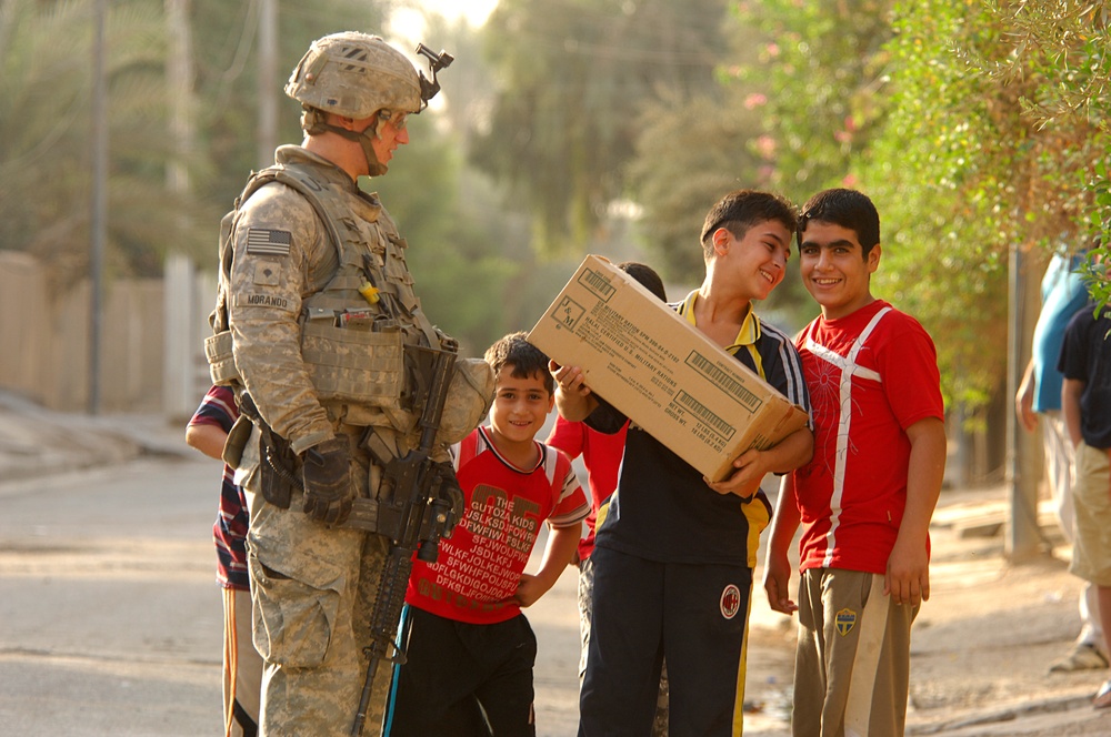 U.S. Soldiers, Working Dogs Search for Weapons Cache
