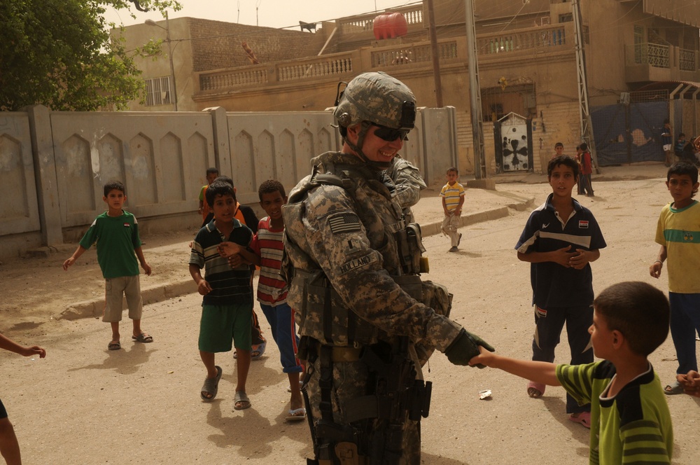 Civil Affairs Conduct Patrol in Sadr City