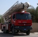 NY Firefighter delivers new ladder truck to IZ FD