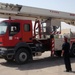 NY Firefighter delivers new ladder truck to IZ FD