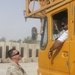 Combat Engineer Tears Down Barriers With Iraqis