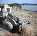 Rhinos use heavy equipment for bridge construction
