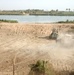 Rhinos use heavy equipment for bridge construction