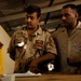 Strike troops help Iraqis turn wrenches
