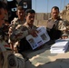 Words, handbills help bring progress, security to Sadr City