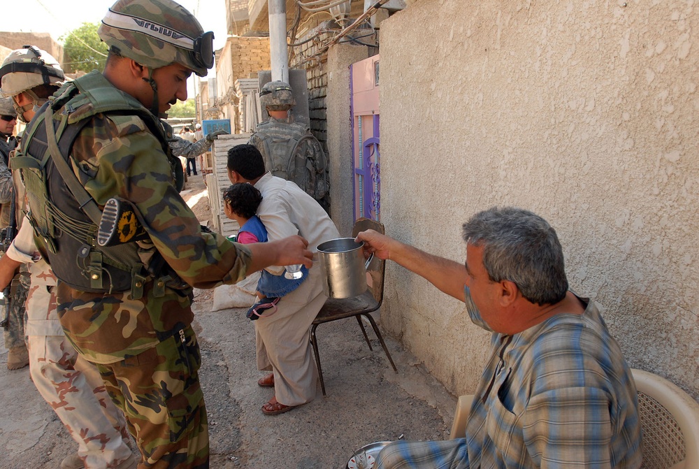 Words, handbills help bring progress, security to Sadr City